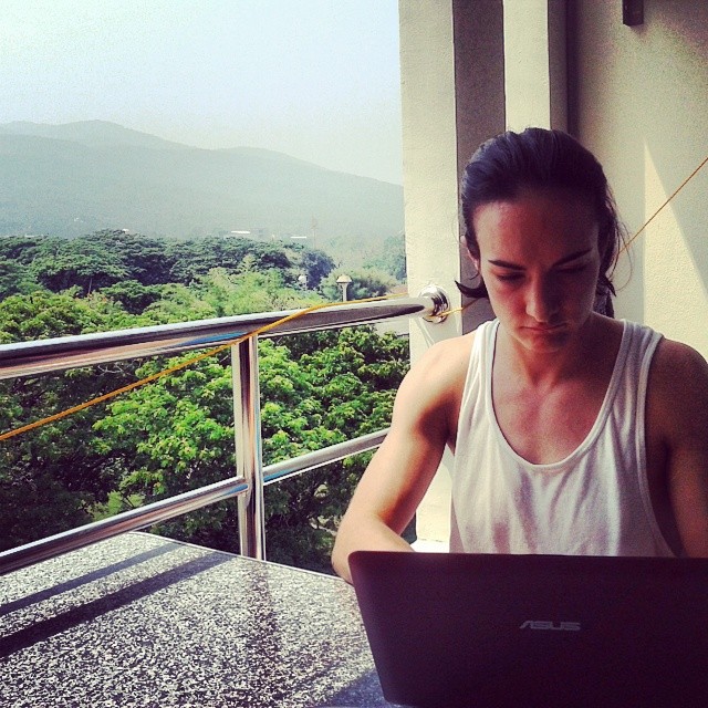 Sylvie writing for her blog, 8 Limbs